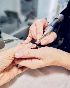 closeup-of-a-woman-s-hands-in-a-nail-salon-getting-2021-08-30-09-10-09-utc.jpg